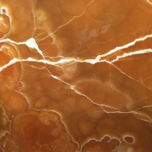 Piedra natural mármol con poca veta de color miel, anaranjado ONYX CARAMELO